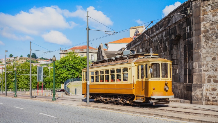 Porto, the Douro valley (Portugal) and Salamanca (Spain) 	(port-to-port cruise) – Portugal Douro Porto Tramway Saiko3p Shutterstock