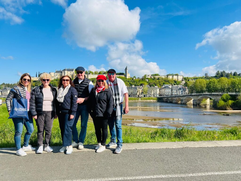 Small group of travellers in France with their tour leader.